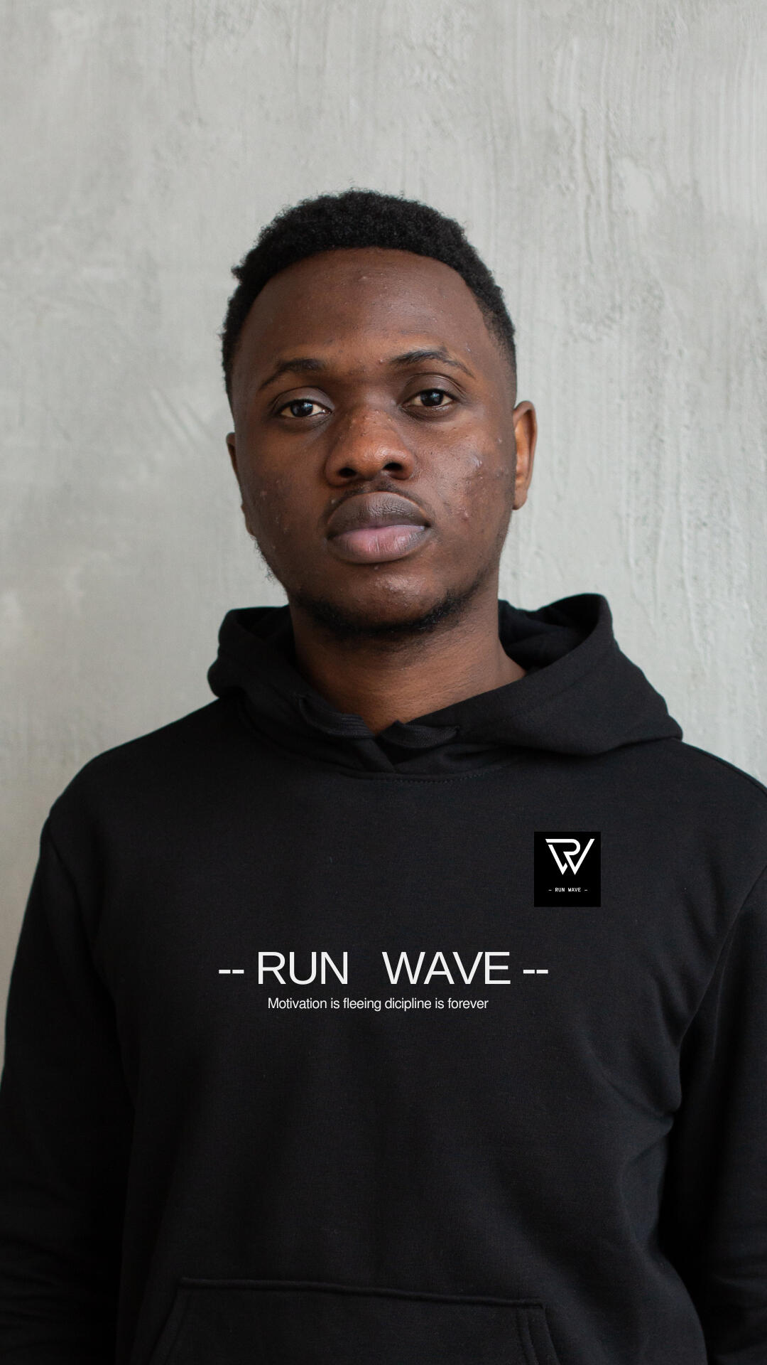 Runwave Standard Hoodie in versatile grey fabric with understated logo embroidery.